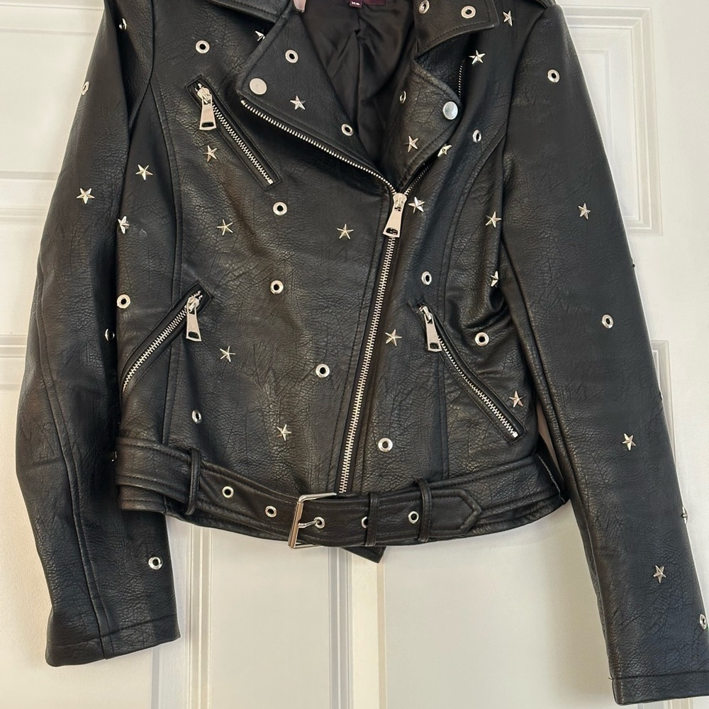 Edgy Moto jacket with studs, perfect layering over jeans or a skirt
